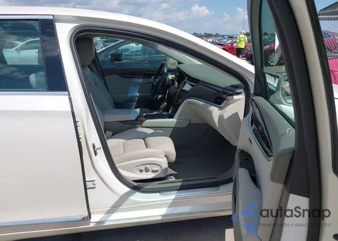 2014 Cadillac Xts Platinum from USA, damaged, VIN 2G61S5S35E9169997